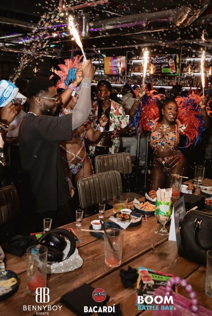 Naomi Sian Bennett-Johnson hostessing at an even with Bacardi, Boom Battle Bar and Benny Boys entertainment