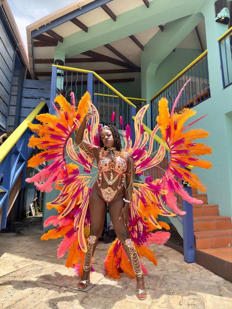 Naomi Sian in a vibes mas costume during Spicemas 2025
